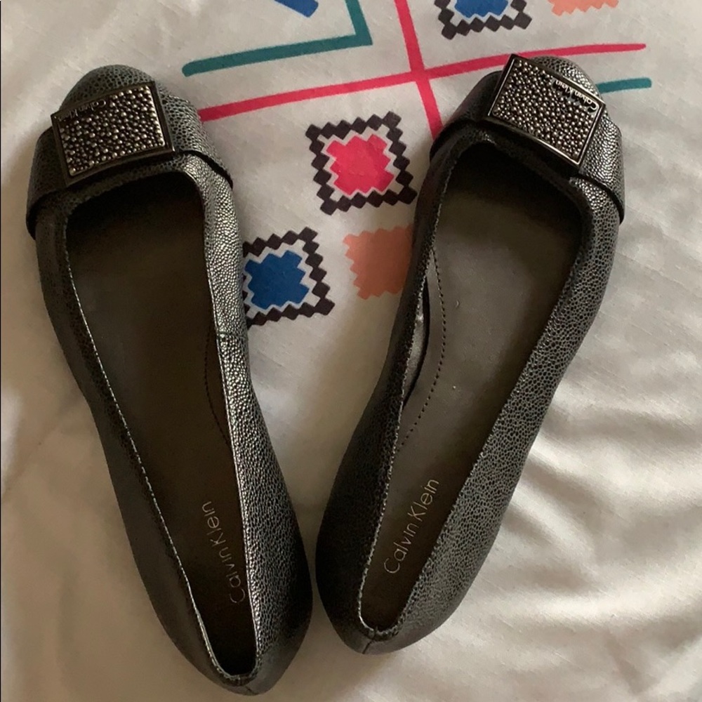 Calvin Klein snakeskin NWOT flat shoes